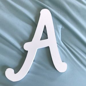Decorative “A” letter.